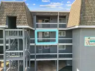 2714 W Beach Drive # 109, Oak Island, NC 28465 — 2-bedroom waterfront condo in W. Long Beach Villas, Oak Island, NC, photo 1 of 44