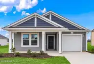 7151 Woodline Drive SW, Sunset Beach, NC 28468 — 3-bedroom home in Seaside Palms, Sunset Beach, NC, photo 1 of 32: Exterior Photo Vantage Elevation D