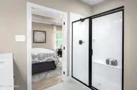 1303 Piper Glen Drive, Sunset Beach, NC 28468 — 2-bedroom home in Sea Trail Plantation, Sunset Beach, NC, photo 8 of 13: Shower