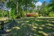 3109 Darrah Lane, Rocky Mount, NC 27804 — 3-bedroom waterfront home, Rocky Mount, NC, photo 8 of 54: Rear View