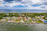 1096 Salter Path Road, Salter Path, NC 28512 — 4-bedroom waterfront home in Salter Path, Salter Path, NC, photo 1 of 30: 78-web-or-mls-1086-salter-path-rd-78