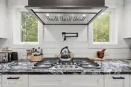 2659 Seashore Road SW, Supply, NC 28462 — 4-bedroom waterfront home in Gators Grant, Supply, NC, photo 18 of 75: Gas stove with Hood and pot filler