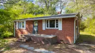 215 Durham Street, Rocky Mount, NC 27801 — 3-bedroom home, Rocky Mount, NC, photo 1 of 24: 1-web-or-mls-DJI_20260408111029_0238_D