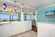 1025 W Beach Drive, Oak Island, NC 28465 — 3-bedroom waterfront home, Oak Island, NC, photo 13 of 45: 1025 W Beach 14
