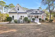 41 Yaupon Way, Oak Island, NC 28465 — 3-bedroom home in Oak Island Estates, Oak Island, NC, photo 1 of 43: 41YauponWay-1