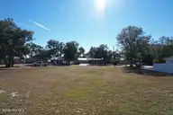 540 540 Lockwood Folly Road SE, Bolivia, NC 28422 — waterfront lot in Sunset Harbor, Bolivia, NC, photo 2 of 3
