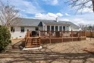 100 Stevens Court, Swansboro, NC 28584 — 3-bedroom waterfront home in River Reach, Swansboro, NC, photo 12 of 56: Back Porch