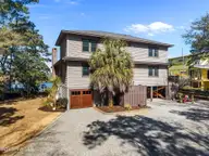 2502 W Yacht Drive, Oak Island, NC 28465 — 4-bedroom waterfront home, Oak Island, NC, photo 2 of 50: 27-web-or-mls-DJI_20260224132318_0634_D