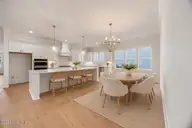 1217 Rockhill Road, Castle Hayne, NC 28429 — 3-bedroom waterfront home in Sunset Reach, Castle Hayne, NC, photo 3 of 75: SR42R Dining and Kitchen