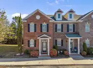 4938 Exton Park Loop, Castle Hayne, NC 28429 — 2-bedroom townhome in Exton Park Townhomes, Castle Hayne, NC, photo 1 of 42: front