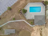 650 Cedar Point Boulevard B35, Cedar Point, NC 28584 — 1-bedroom waterfront condo in Cedar Point Villas, Cedar Point, NC, photo 24 of 27: Pool