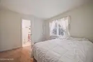 108 Hunters Trail E, Elizabeth City, NC 27909 — 4-bedroom home in Pine Lake, Elizabeth City, NC, photo 20 of 28: bedroom
