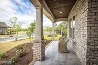 5296 Marco Drive SE, Southport, NC 28461 — 3-bedroom home in The Home Place of Southport, Southport, NC, photo 6 of 51: 6- Exterior