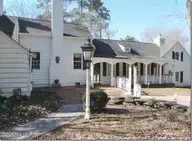 2856a Forest Hills Loop SW, Wilson, NC 27893 — 3-bedroom waterfront home, Wilson, NC, photo 12 of 58: 12 _ Stone Path from Sun Porch