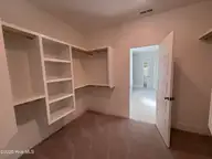 105 Flat Clam Drive, Wilmington, NC 28401 — 3-bedroom home in Riverside Cove, Wilmington, NC, photo 17 of 26: Owners Closet
