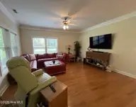 300 Lighthouse Lane 3 B1, Cedar Point, NC 28584 — 2-bedroom condo in Village at Magens Bay, Cedar Point, NC, photo 6 of 23: 6 Living room