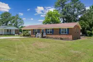 1910 Carolina Circle, Goldsboro, NC 27530 — 3-bedroom home in Forkville, Goldsboro, NC, photo 4 of 34: Right Side View of Home
