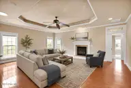 3516 Gladehill Lane, Leland, NC 28451 — 3-bedroom townhome in Brunswick Forest, Leland, NC, photo 10 of 68: 3516 Gladehill Lane Living Room VS