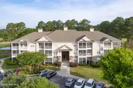 260 Woodlands Way Unit 2, Calabash, NC 28467 — 3-bedroom condo in Crow Creek, Calabash, NC, photo 1 of 48: 260 Woodlands drone update-1