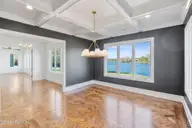 515 Martin Livestock Road, Princeton, NC 27569 — 5-bedroom waterfront home in Lakeview Estates, Princeton, NC, photo 18 of 52: DSC04760-Dining room water and sitting r