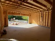 1117 Natal Drive SE, Bolivia, NC 28422 — 4-bedroom home in Palmetto Creek, Bolivia, NC, photo 9 of 13: Garage