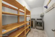 2050 Lindrick Court NW, Calabash, NC 28467 — 3-bedroom home in Spring Mill, Calabash, NC, photo 20 of 32: 61-web-or-mls-50 laundry room
