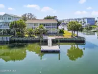 401 Dolphin Street, Sunset Beach, NC 28468 — 3-bedroom waterfront home, Sunset Beach, NC, photo 3 of 63: Kahunaphoto.com-0057