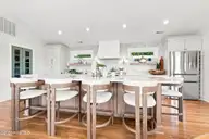 103 Georgia Street, Emerald Isle, NC 28594 — 4-bedroom waterfront home in Emerald Isle By The Sea, Emerald Isle, NC, photo 6 of 60: Kitchen Island