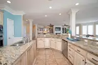 5715 Ocean Drive, Emerald Isle, NC 28594 — 8-bedroom waterfront home in Surf Landing Cove, Emerald Isle, NC, photo 15 of 64: Granite countertops