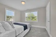 134 Wild Berry Lane, Hampstead, NC 28443 — 5-bedroom waterfront home in Bent Tree, Hampstead, NC, photo 18 of 46: Bedroom