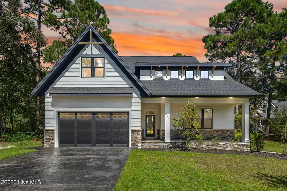 613 Riverwood Drive SE, Bolivia, NC 28422 — 4-bedroom home in Winding River Plantation, Bolivia, NC, photo 1 of 63