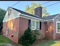 1210 Meadowood Drive, Kinston, NC 28501 — 4-bedroom home in Perry Park Extension, Kinston, NC, photo 4 of 41: Side of the house