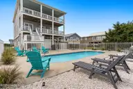 1012 W Beach Drive, Oak Island, NC 28465 — 5-bedroom waterfront home in Long Beach, Oak Island, NC, photo 12 of 70: 12-web-or-mls-CAMMediaLLC.com (82 of 83)