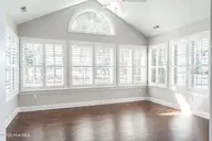 117 W Chelsea Court, Southern Pines, NC 28387 — 3-bedroom condo in Mid South Club, Southern Pines, NC, photo 12 of 43: Sunroom