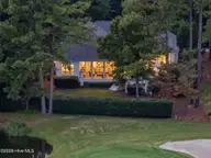 8900 Mahogany Run, Wilmington, NC 28411 — 3-bedroom home in Porters Neck Plantation, Wilmington, NC, photo 2 of 75: 103-web-or-mls-09_T09_aerial-home-from-t