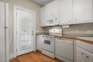 2041 Cottage Way, Rocky Mount, NC 27803 — 3-bedroom home in Beth Eden, Rocky Mount, NC, photo 18 of 31: Eat-In Kitchen