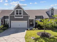 627 Cambeck Drive SE Unit 3, Leland, NC 28451 — 3-bedroom waterfront townhome in Hawkeswater at the River, Leland, NC, photo 2 of 73: 2-web-or-mls-DJI_20250619162331_0307_D
