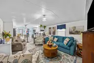 721 Blue Sail Drive SE, Bolivia, NC 28422 — 2-bedroom manufactured home in River Run Plantation, Bolivia, NC, photo 12 of 59: 5_living room