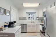 505 N Carolina Beach Avenue Unit 1c, Carolina Beach, NC 28428 — 2-bedroom waterfront condo in Winds at Carolina Beach, Carolina Beach, NC, photo 14 of 44: Kitchen 1