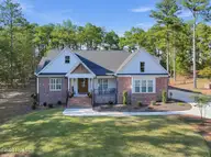 113 Pittman Road, Seven Lakes, NC 27376 — 4-bedroom waterfront home in Seven Lakes West, Seven Lakes, NC, photo 1 of 65: Carey.1