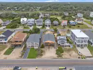 210 W Beach Drive, Oak Island, NC 28465 — 4-bedroom waterfront home, Oak Island, NC, photo 7 of 42: 7-web-or-mls-DJI_20250614140122_0272_D