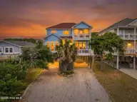 1616 E Dolphin Drive, Oak Island, NC 28465 — 4-bedroom waterfront home in Long Beach, Oak Island, NC, photo 1 of 55: Kahunaphoto.com--10 copy