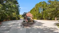 615 Jenoa Drive, Castle Hayne, NC 28429 — 4-bedroom townhome in River Bluffs, Castle Hayne, NC, photo 7 of 50: DJI_20260928112431_0050_D