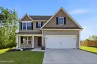 697 Poppleton Drive, Hampstead, NC 28443 — 4-bedroom home in Harrison Cove, Hampstead, NC, photo 1 of 46: 1_697_poppleton_dr_001