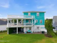 817 Ketch Court, Kure Beach, NC 28449 — 4-bedroom home in Kure Beach Village, Kure Beach, NC, photo 4 of 56: 8-web-or-mls-dji_20260430170723_0666_d