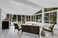 6992 Riverpoint Road, Elm City, NC 27822 — 4-bedroom waterfront home in Riverpoint, Elm City, NC, photo 23 of 42: The Sunroom You'll Fall in Love With!