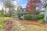 1321 Marsh Line Court SW, Shallotte, NC 28470 — 3-bedroom waterfront home in Marsh Cove, Shallotte, NC, photo 5 of 75: Walkway From Detached Garage