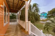 200 Shipwreck Lane, Emerald Isle, NC 28594 — 3-bedroom waterfront home in Spinnakers Reach, Emerald Isle, NC, photo 13 of 59: Front porch