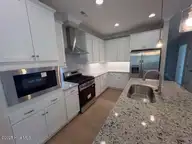 117 Flat Clam Drive, Wilmington, NC 28401 — 3-bedroom home in Riverside Cove, Wilmington, NC, photo 12 of 28: Kitchen