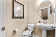 418 Goldenleaf Circle, Whispering Pines, NC 28327 — 4-bedroom home in Summerfield at Arrowstone, Whispering Pines, NC, photo 8 of 47: downstairs bathroom